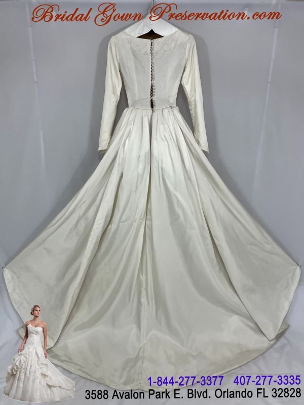 60 year old wedding gown now restored-Restoration