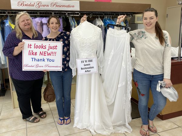 Wedding Gown restoration 35 year old;Bride happy and excited to wear the restored wedding gown; 